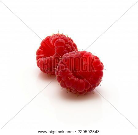 Red raspberries isolated on white background two whole