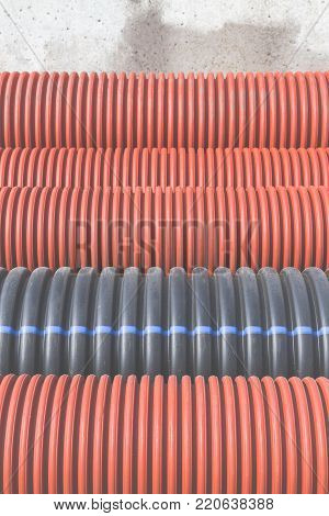 Construction Orange And Black Plastic Pipes
