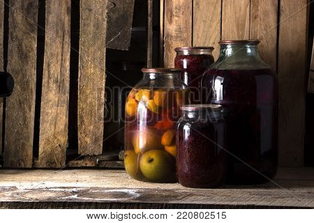 home preservation in a dark cellar in which breaks through several rays of light close up