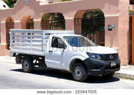 Tulum, Mexico - May 17, 2017: Pickup truck Nissan Navara in the city street.