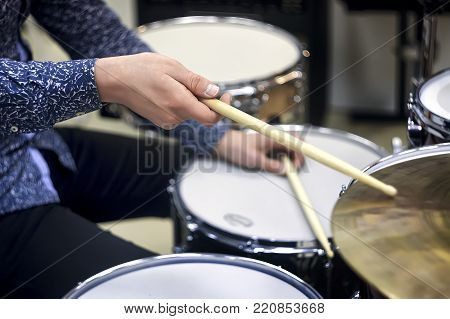 Professional drum set closeup. Drummer with drums, live music concert.