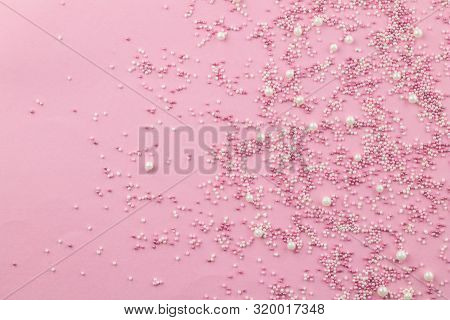 Pink And White Edible Pearlized Sprinkles On Pink Background - Cake Topping Pearly Pink Sprinkles To