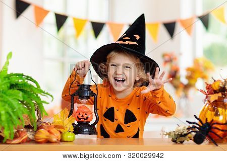 Child In Halloween Costume. Kids Trick Or Treat.