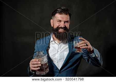 Drinking Whiskey Or Brandy Or Cognac. Tasting And Degustation Concept. Luxury Alcohol Drink