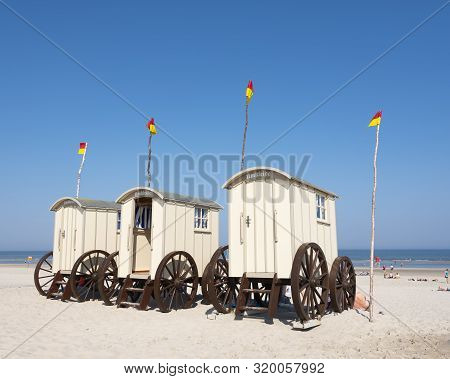 Norderney, Germany, 25 August 2019: Old Fashioned Bathing Carts Used For Changing On Sunny Beach Of 