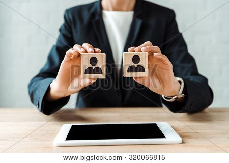 Cropped View Of Woman Holding Wooden Cubes Near Digital Tablet With Blank Screen