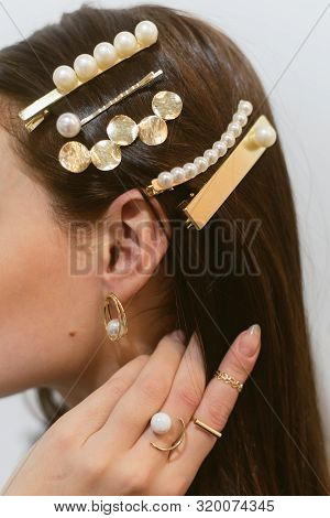 Stylish Hairpins For A Dark-haired Girl. Pearl Earrings.