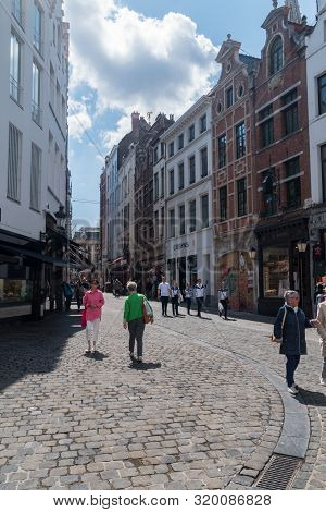 Brussels, Belgium - June 6, 2019: Small Narrow Rue Des Beurre Street With Shops And Restaurants.