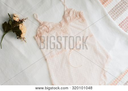 Transparent Underwear. One-piece Sexy Underwear On The Bed.