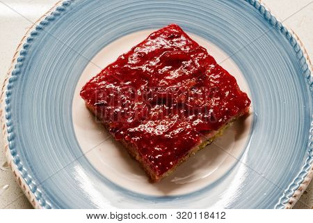Trilece Cake Dessert With Red Plum Puree Jam / Marmalade.