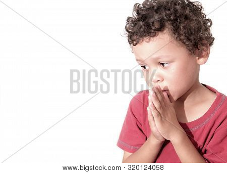 Boy Praying To God Stock Image With Hands Held Together With Closed Eyes Stock Photo
