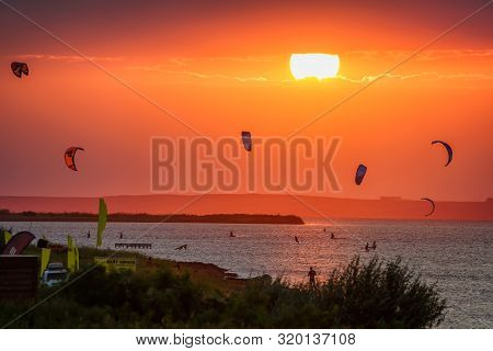 Anapa, Russia - July 19, 2016: Kitesurfers Are Riding On A Bugaz Lake At Beautiful Anapa Resort Summ