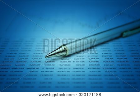 Closeup Of Pencil On Business Graph, Financial And Accounting Concept