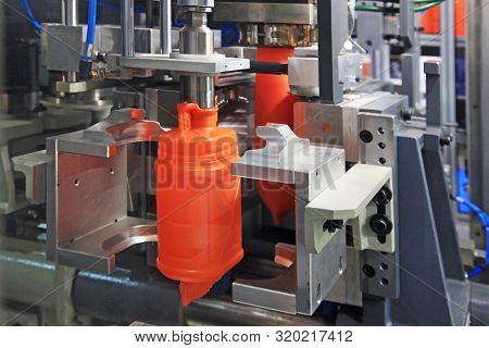 Formation Of Plastic Cans In The Mold