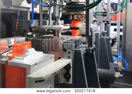 Formation Of Plastic Cans In The Mold