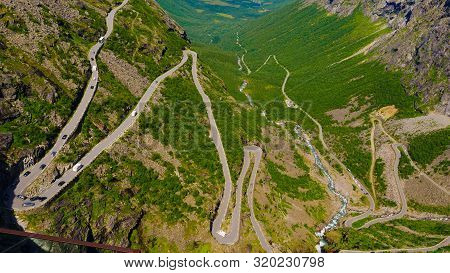 Trolls Path Trollstigen Winding Scenic Mountain Road With Many Cars, Norway Europe. National Tourist