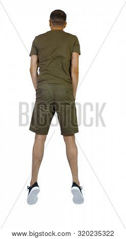 Back view of man in zero gravity or a fall. guy is flying, falling or floating in the air. Side view people collection.  Isolated over white background. The guy in sneakers hung in zero gravity.