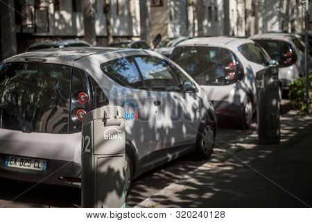 Lyon, France - July 17, 2019: Bluely Charging Station In Front Of Electrical Car. Bluely Is A Car Re