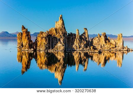 Picturesque Mono lake. The columns-remains of bizzare shapes of 