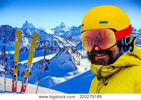 Skiing with amazing view of swiss famous mountains in beautiful winter snow  Mt Fort. The matterhorn and the Dent d'Herens. In the foreground the Grand Desert glacier.