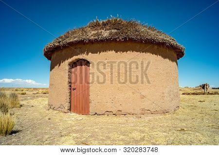 Rustic Traditional Uru House Made Of 
Adobes In The Bolivian Altiplano