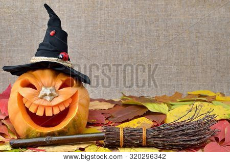 Pumpkin For Halloween Carved In The Shape Of A Smile. Jack Lantern Head Carved From Pumpkin For Hall