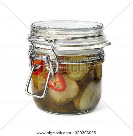 Jar With Pickled Cucumbers On White Background