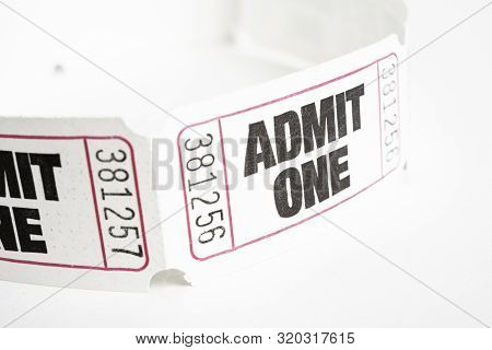 A Macro Or Close-up Shot Of A Strip Of Generic White Sequentially Numbered Admittance Paper Ticket.