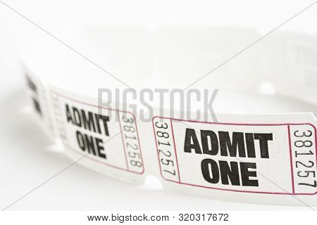 A Macro Or Close-up Shot Of A Strip Of Generic White Sequentially Numbered Admittance Paper Ticket.