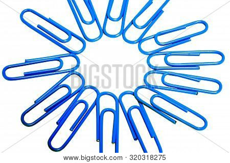 Close-up Of Blue Paper Clips Taken Concatenation Is A Circle With Concept About Teamwork For Busines
