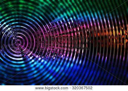 Vibrate in rainbow color spectrum. Expand, grow, spread, or ripple abstract concept image.