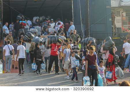 Refugees And Migrants Disembark To The Port Of Thessaloniki After Being Transfered From The Refugee