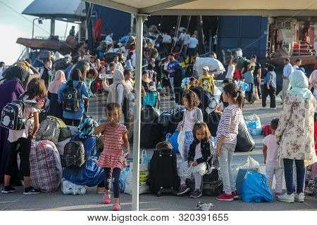 Refugees And Migrants Disembark To The Port Of Thessaloniki After Being Transfered From The Refugee
