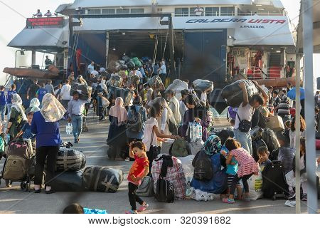 Refugees And Migrants Disembark To The Port Of Thessaloniki After Being Transfered From The Refugee