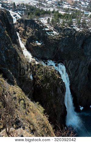 Famous Voringfossen Gorge With Waterfall Near Eidfjord In Province Of Hordaland, Norway