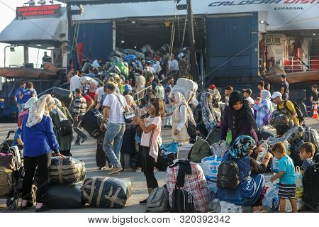 Refugees And Migrants Disembark To The Port Of Thessaloniki After Being Transfered From The Refugee