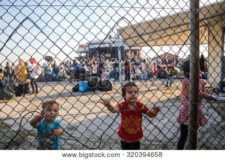 Refugee Children Disembark In The Port Of Thessaloniki After Being Transfered From The Refugee Camp