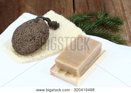 Handmade Bar Of Soap, Pumice Stone And Washcloth. Olive Soap, Facecloth And Pumice Stone  On Wooden 
