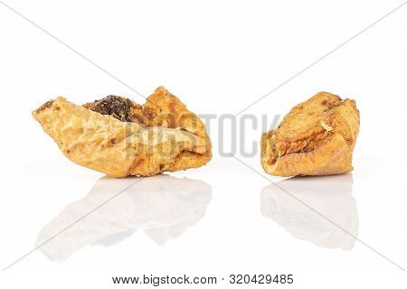 Group Of Two Pieces Of Roseship Of Lingonberry Strawberry Fruit Tea Macro Isolated On White Backgrou