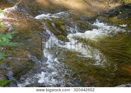 Water Flowing From The Hardraw Waterfall In The Yorkshire Dales