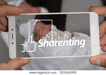 Sharenting Concept, Taking A Photo Of A Baby With The Smartphone
