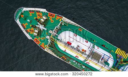 Red Tanker Ship Loading And Unloading Oil And Gas At Industrial Port, Business Import Export Petroch
