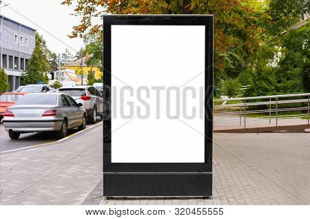 Advertising Space Under The Poster. Lightposter Citylight Mockup Small Billboard In The City Near Th
