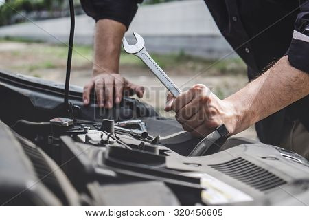 Services Car Engine Machine Concept, Automobile Mechanic Repairman Hands Repairing A Car Engine Auto