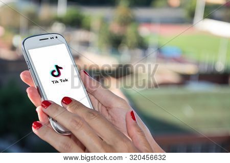 Barcelona, Spain. September 2019: Woman Holding A Smartphone With Streaming Service Media And Video 