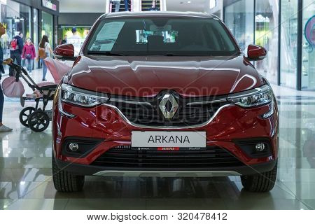 Tyumen, Russia-avg 20, 2019: Red Car Renault Arcana In The Shopping Center Crystal.