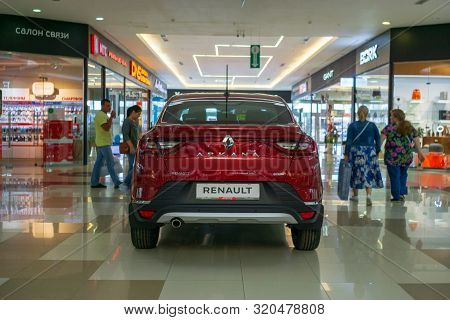 Tyumen, Russia-avg 20, 2019: Red Car Renault Arcana In The Shopping Center Crystal.