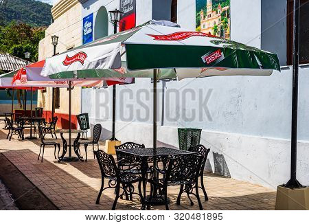 Santiago De Cuba, Cuba - 2019. Metal Patio Table And Chairs.