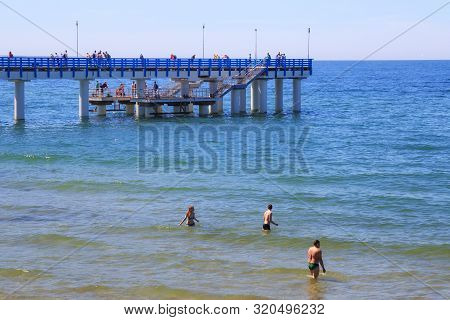 Zelenogradsk, Kaliningrad Region, Russia - June 18, 2019: View Of The Long Mole On The Baltic Sea Co