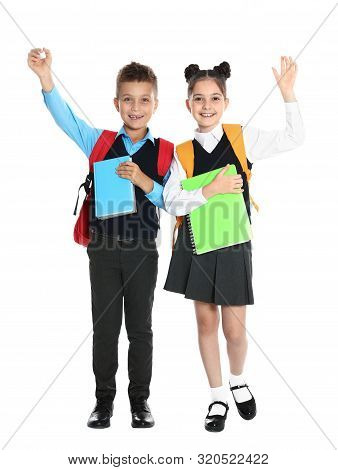 Happy Children In School Uniform On White Background